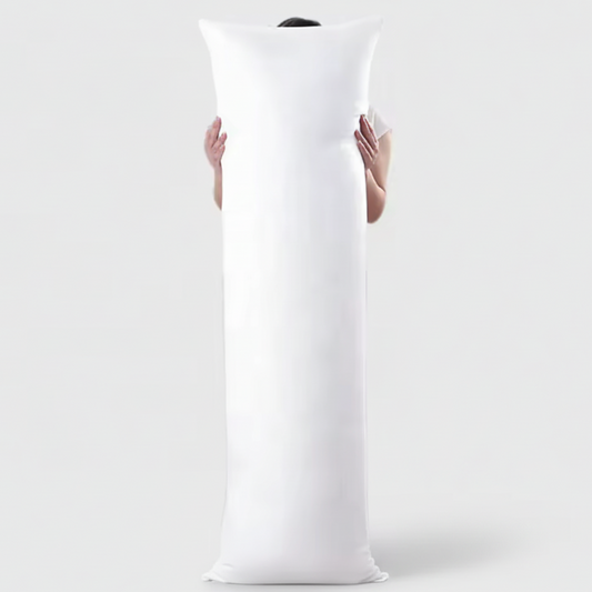 Photo du traversin de soutien debout, pour que l'on puisse voir sa taille.