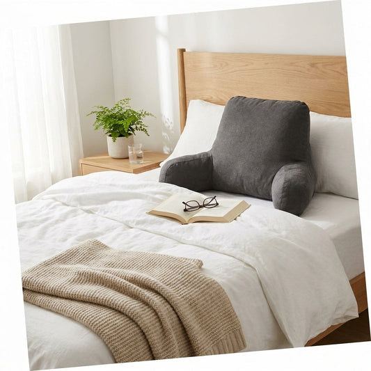 Coussin de lecture sur lit blanc avec livre et tasse de thé - comparatif mémoire de forme vs classique Nerua