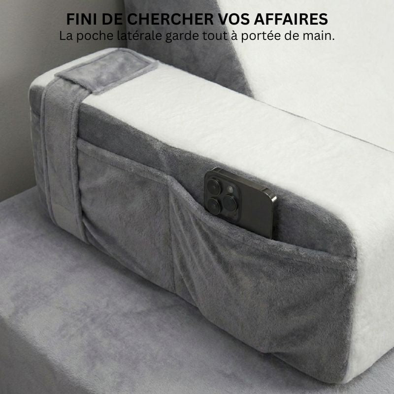 Détail de la poche latérale intégrée du coussin de lecture Ergonomique pour ranger téléphone et télécommande