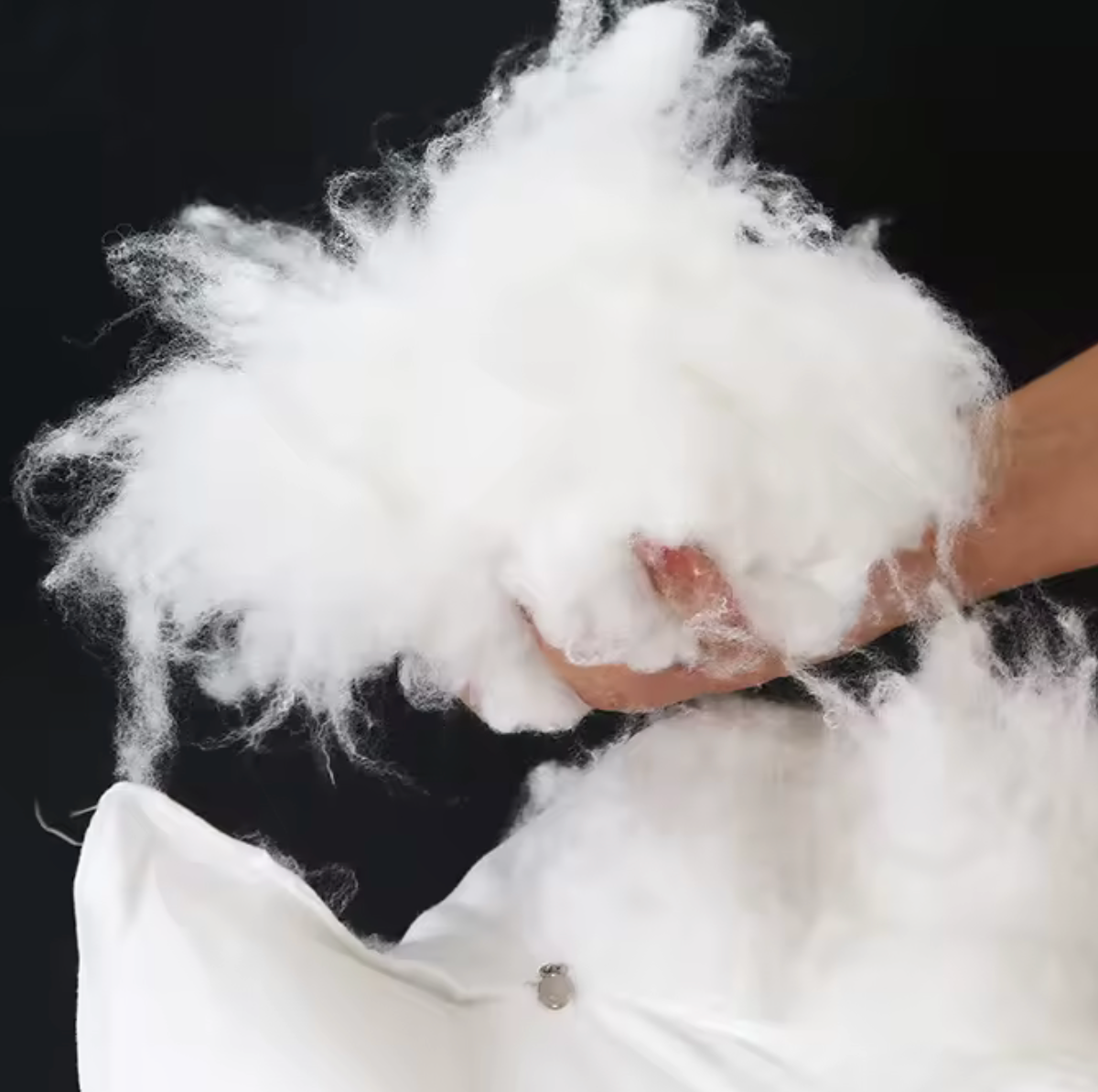 Matériaux du traversin de soutien, on y voit notamment les fibres présentes à l'intérieur de la housse.