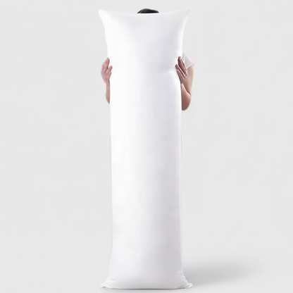Photo du traversin de soutien debout, pour que l'on puisse voir sa taille.